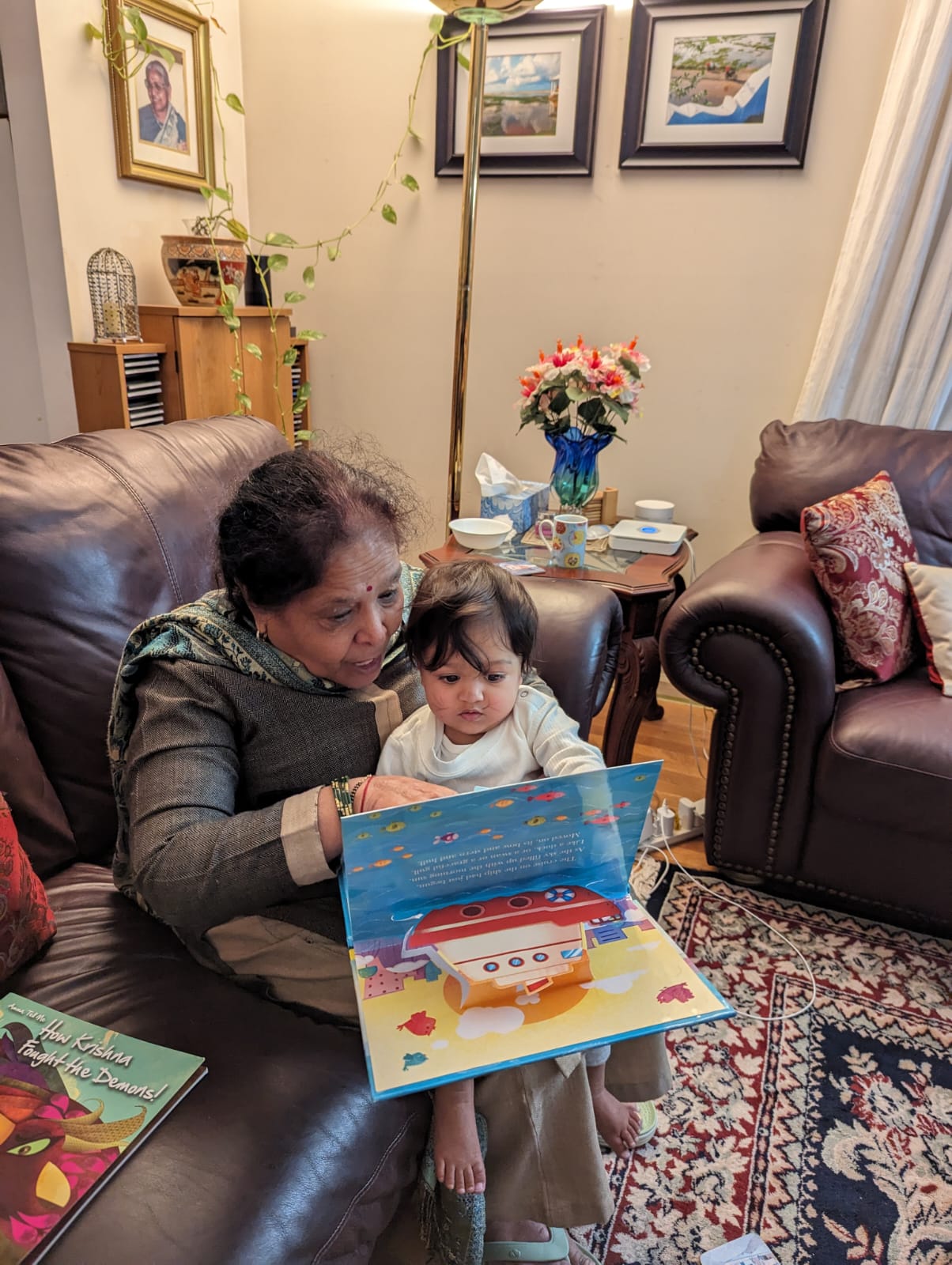 Anuradha ji reading to her granddaughter